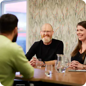 People smiling during a meeting 