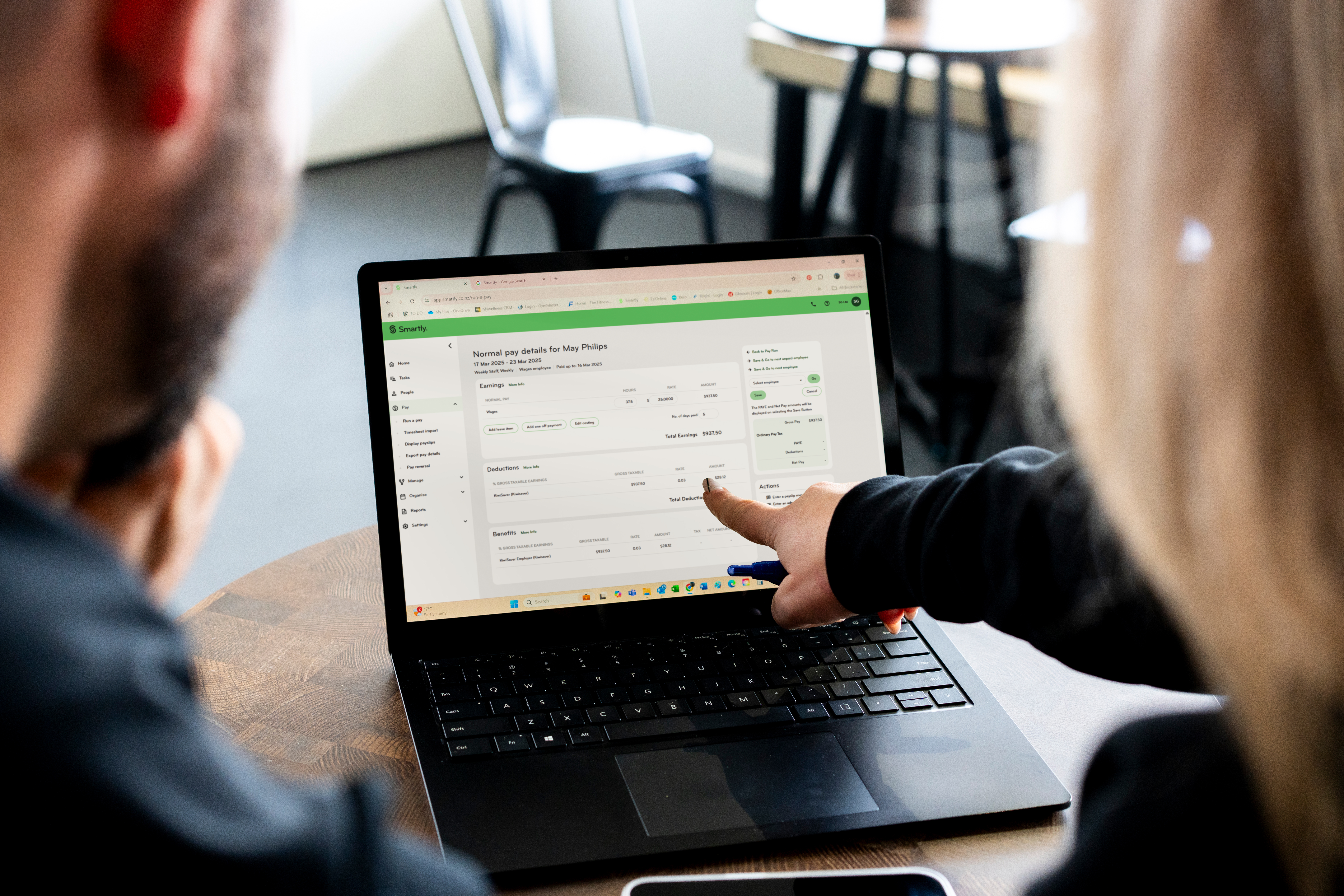 Two construction workers talking together