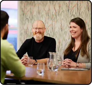 People smiling during a meeting 